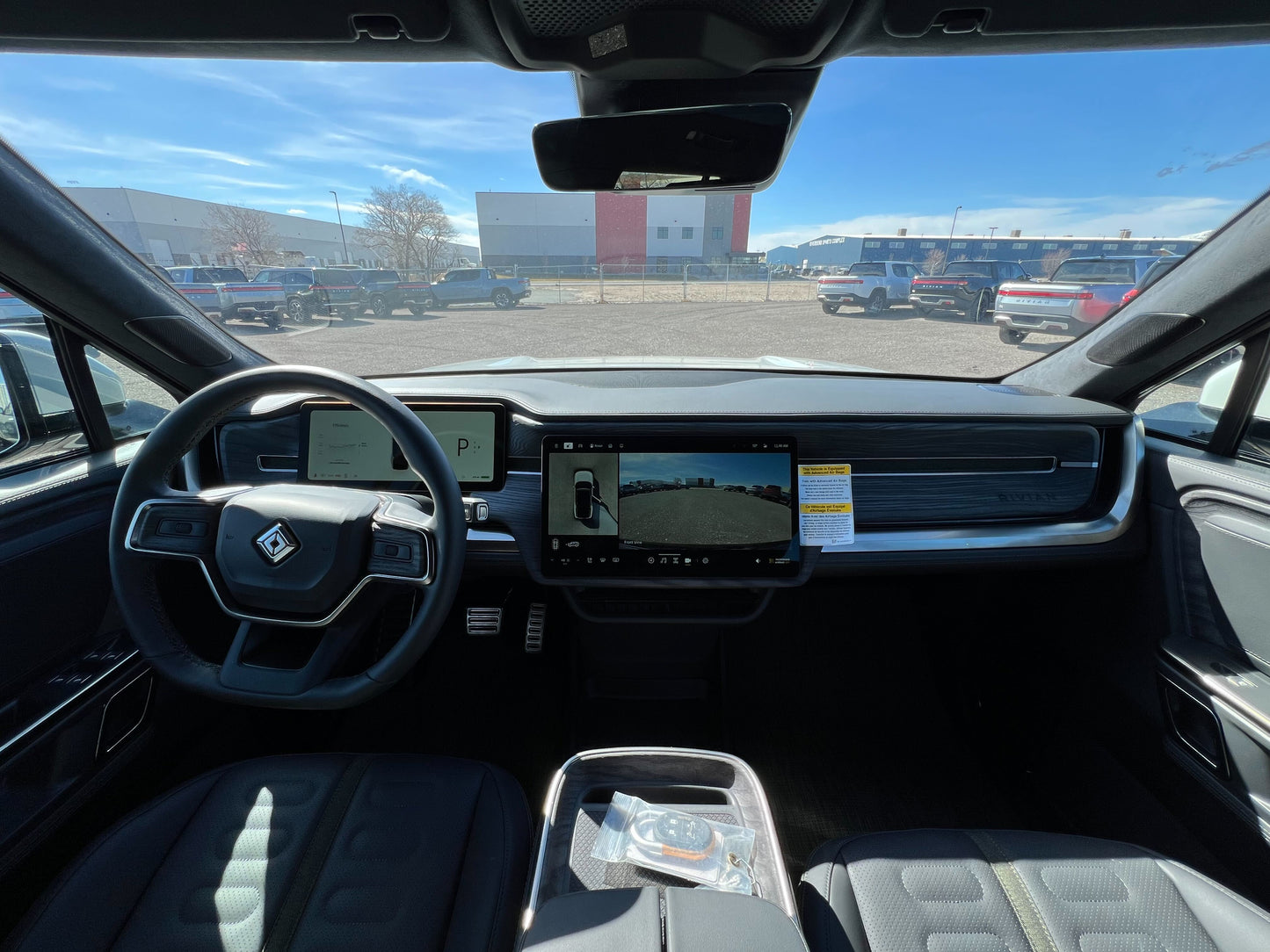2022 Rivian R1S - 100 miles - $79,700