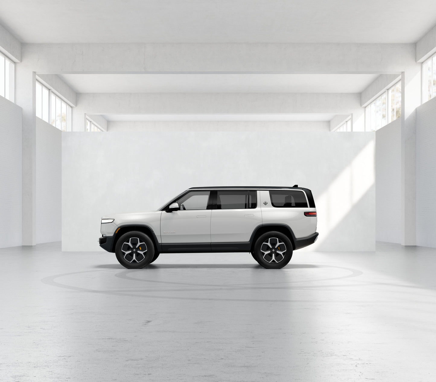 2023 Rivian R1S - 129 miles - $78,200